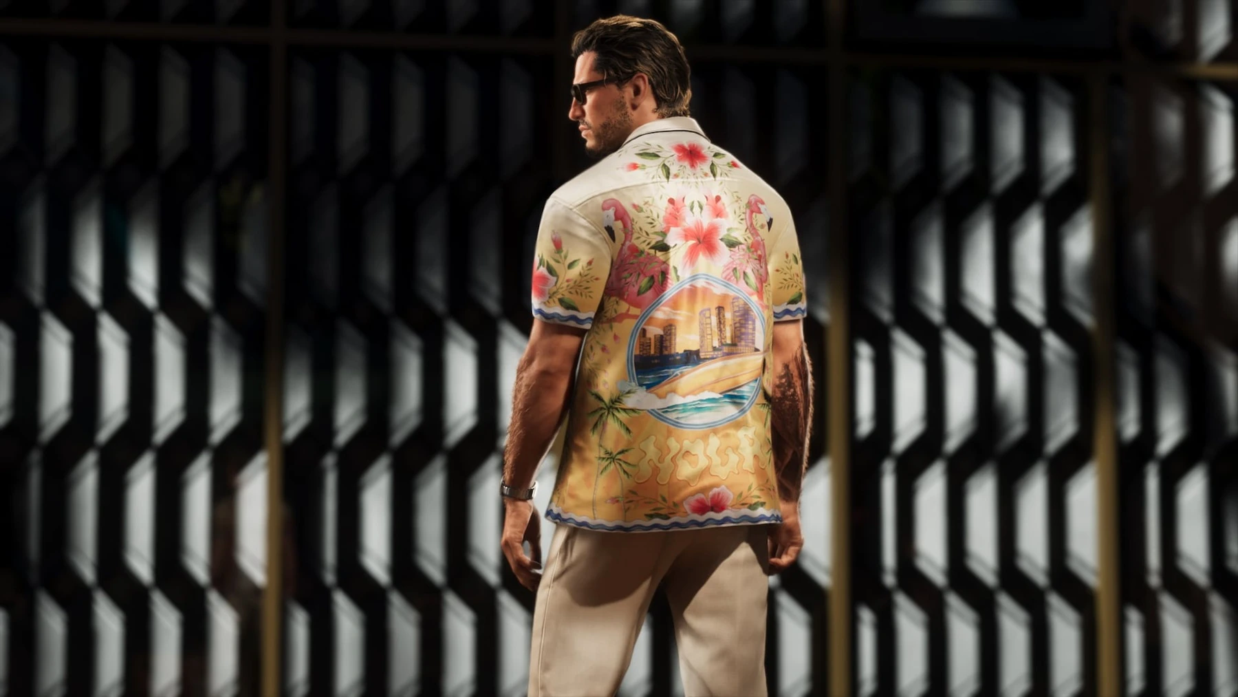公式GTA 6シーンで、ジェイソンが格子越しの窓の外を見る
